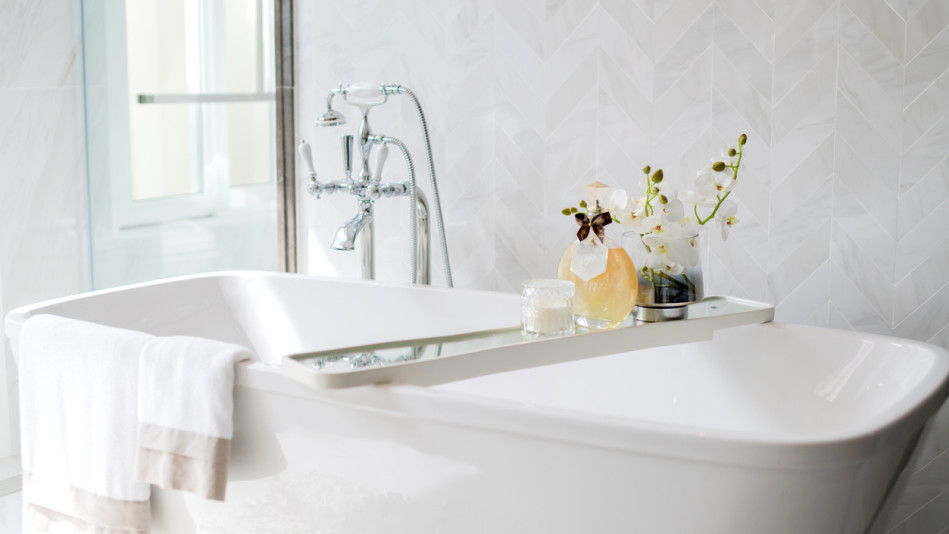 close up chrome faucet shower bath tub room interior design